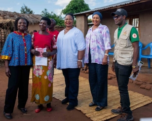 Kwakwa, left, flanked by Medison, in red blouses, Sendeza and deputy Health Minister Halima Daudi