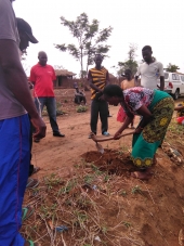 A council officer demonstrates on how to reshape a road