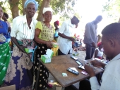 Beneficiaries registering ther particulars on TNM Mpamba